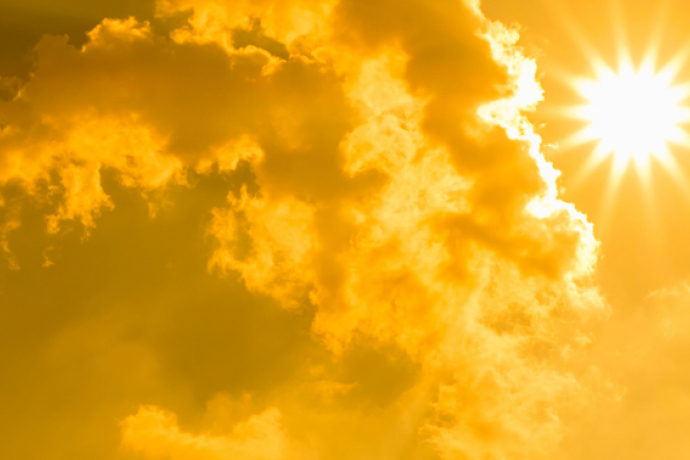 Science blog banner: sun and clouds